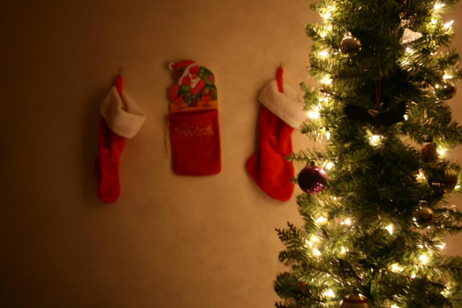 My Christmas tree and stockings that decorate the living room. 