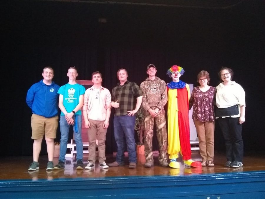 Carson Fritchie, Dallas Kidwell, Cooper Meadows, Braeton Davis, Chase Knoblett, Evan Holscher, Mrs. Hyde, and Kelsey Lanham, Drama Club seniors, appear for the last time on the PHS stage.