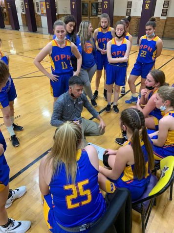 The OPH Girls Basketball Team. Coach Blank is drawing up a killer plan to dominate Casey-Westfield. 
