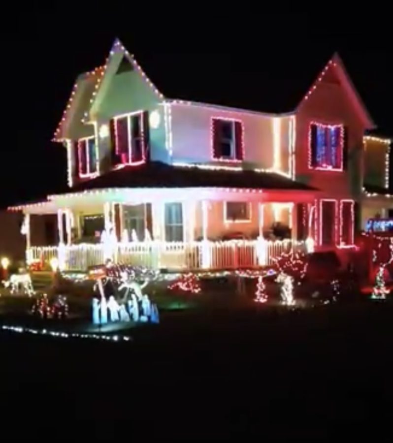 Neighbors house with colored lights 