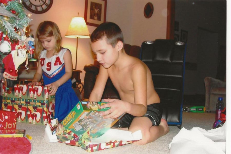 My brother and I opening gifts on Christmas morning