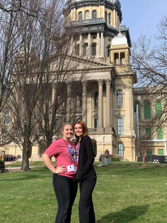 Addison and Morgan pose for a quick photo opp. outside the state capitol!