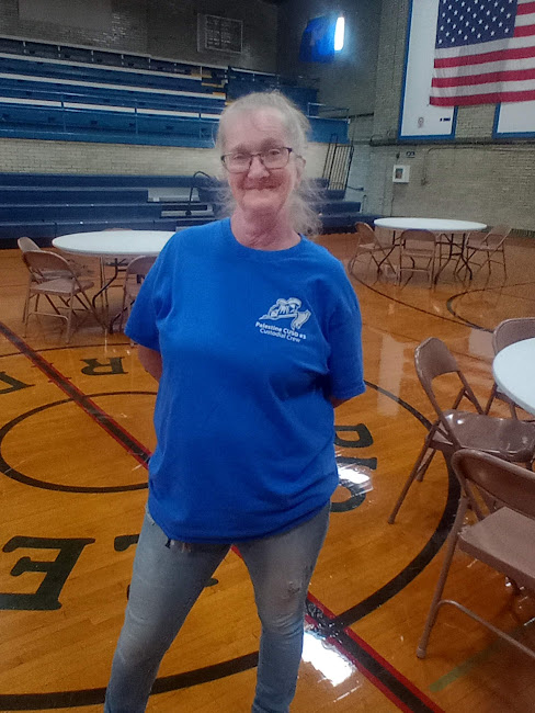 Judy White after she set up tables for lunch.
