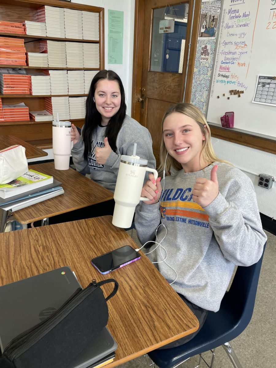 Aubree Ramsey and Kiara Fralicker showing off their Stanley Quenchers.