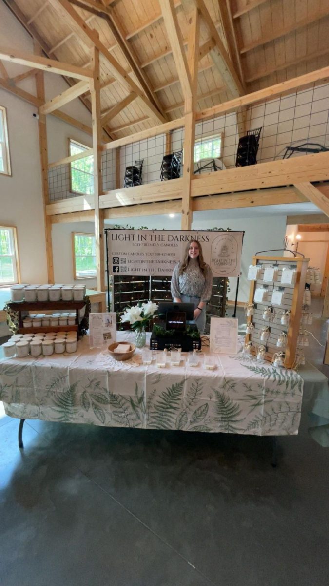 Autumn Taylor and her Light in the Darkness candle business at the CEO Trade Show