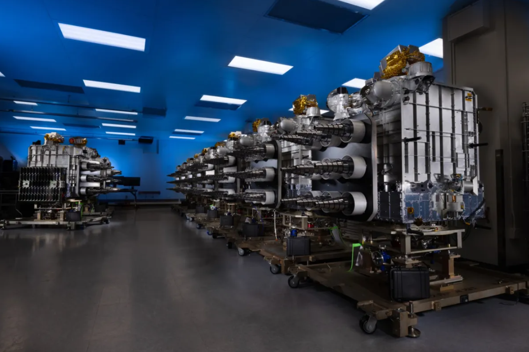 A row of Transport Layer Tranche 1 satellites made by Lockheed Martin for the Space Development Agency. 